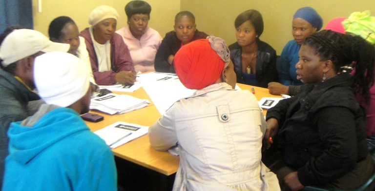 Local Economic Development participants actively engaging in group work